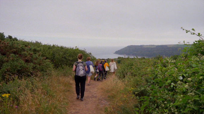 Video Production for Non-Profit showing people walking on a trail for a nature-focused non-profit.