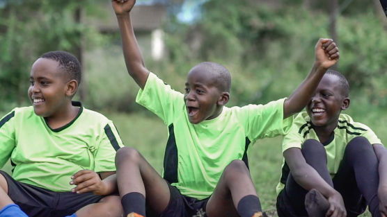 Charity video showing volunteer impact and community involvement.