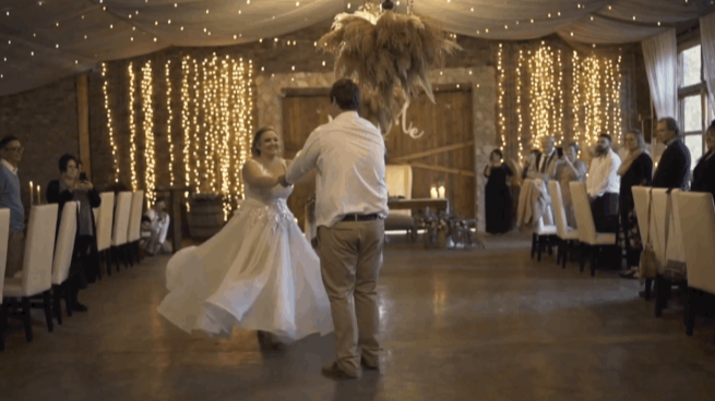 Guests dancing at the reception