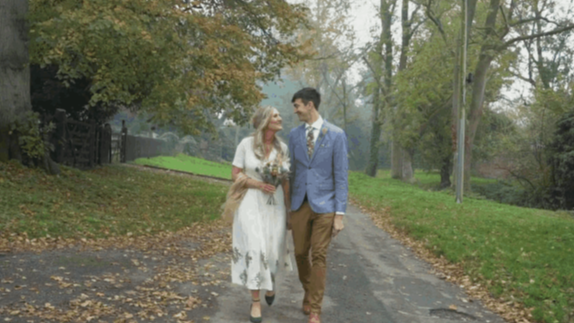 Couple walking down a street after the ceremony — Portugal wedding video