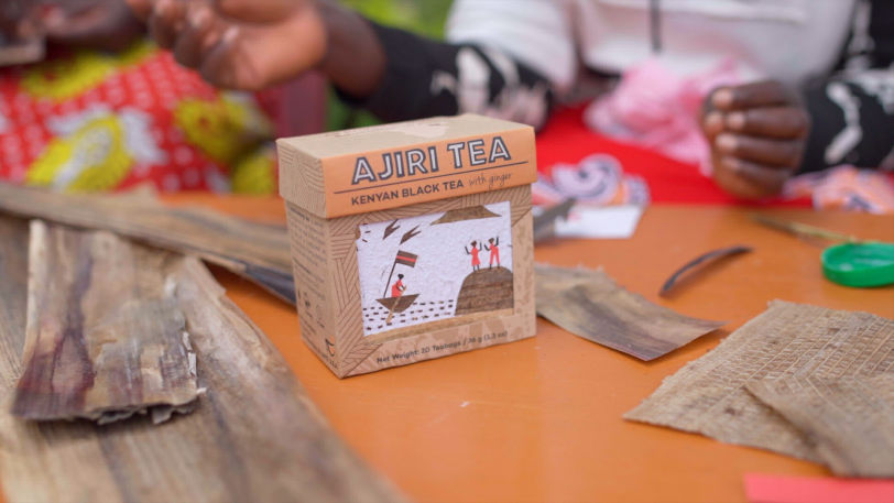 Shot of tea box amongst banana bark 