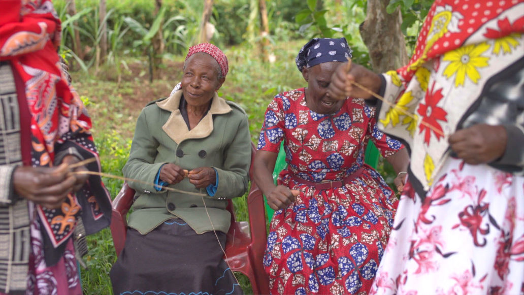 Women crafting and chatting in Kisii, Kenya